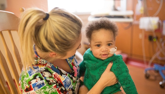 Woman holding a baby